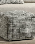 grey cushioned ottoman